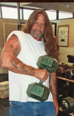 100 pound dumbell or bikes