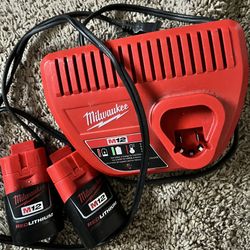 Milwaukee M12 Charger And Two Batteries