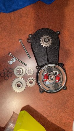 transmission gear reduction box clutch for 2-stroke 47cc-50cc mini pocket bikes, ATVs, and https://offerup.com/redirect/?o=Z28ta2FydHMuSXQ= includes a