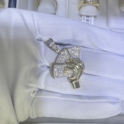Gold money in hand pendant with diamonds 10k gold