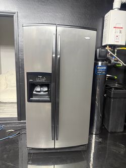 Double sided whirlpool refrigerator