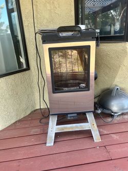Outdoor meat smoker