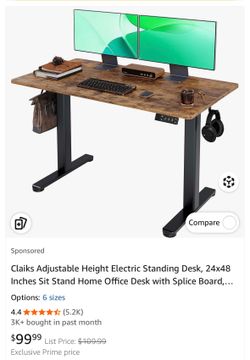 Brown adjustable height desk