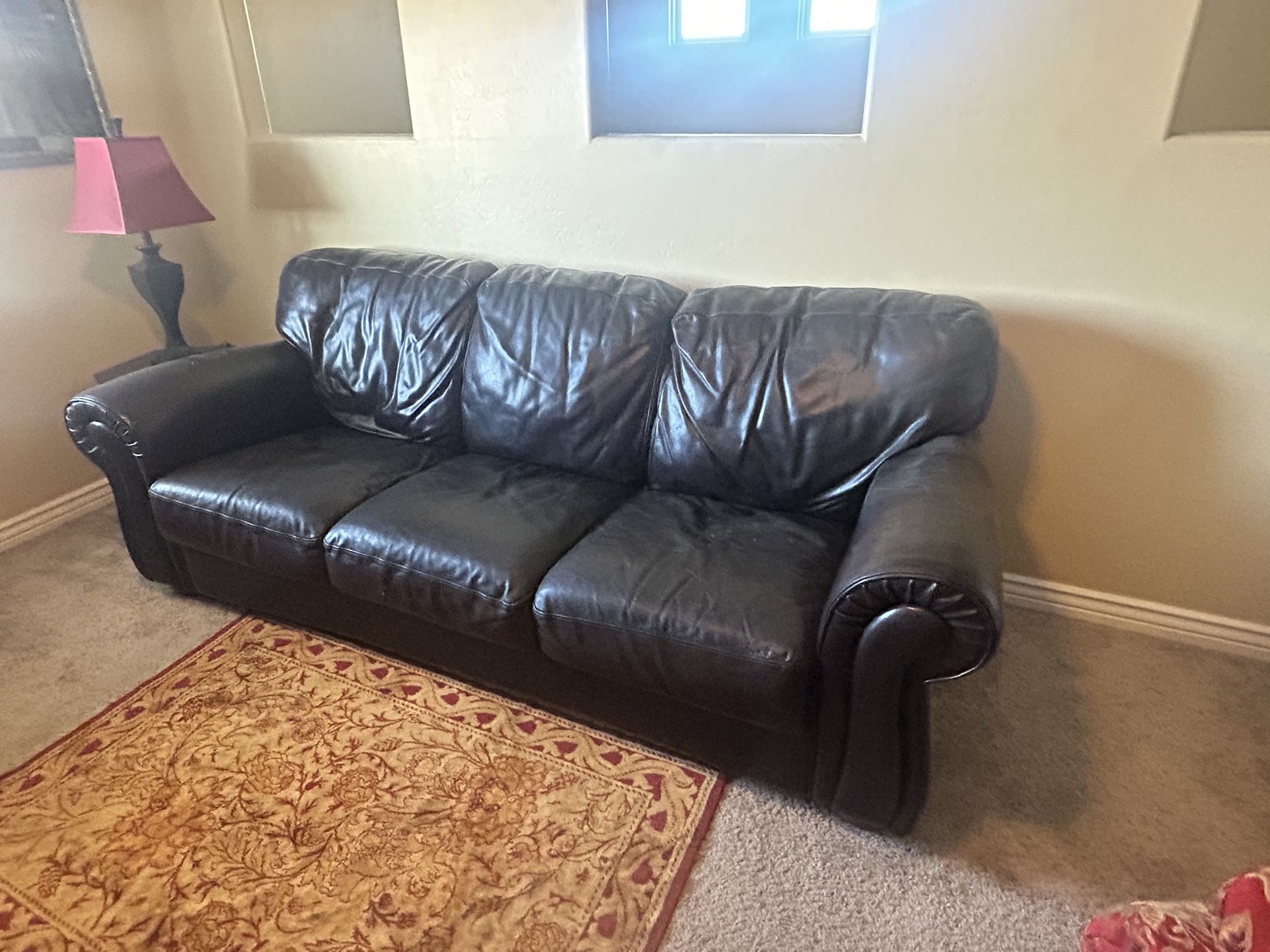 FREE BROWN LEATHER COUCH