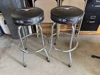 A Pair Of Fender Barstools