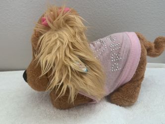 “Lucy” toy dog barks, sits, eats on command ‼️SALE if picked up this week