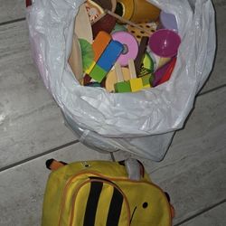 Bag Full Of Plastic Fake Food, Menus, Pots And Pans