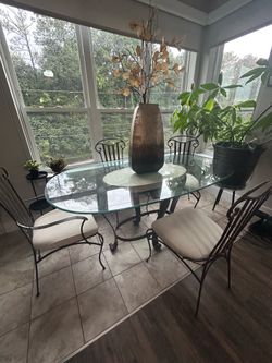 Elegant Glass Top Dining Room Set with Two Bar Stools and Bakers Rack.