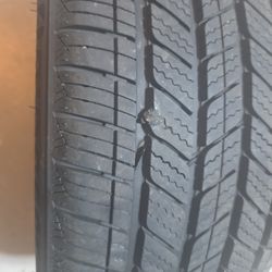 Bridgestone In Good Condition Has A Plug In It Hose Air 215 50 18.   75% Tread
