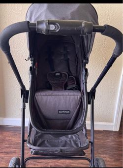 Black stroller with bassinet