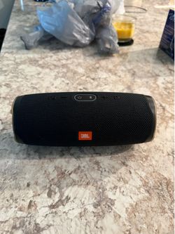 JBL speaker, laser bore sighting kit, coffee maker, router/ modem