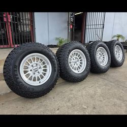 17" KMC rims w/ 33" Goodyear MT Tires 