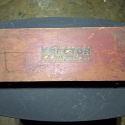 vintage A.C. Gilbert Erector Set housed in its original red wooden carrying case, popular from the 1940s through the 1960s. These classic American toy