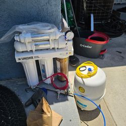 Ukoke 6-Stage Under-Sink Reverse Osmosis (RO) Water Filtration System (Model RO8-L or similar). It includes the main 3-canister base unit