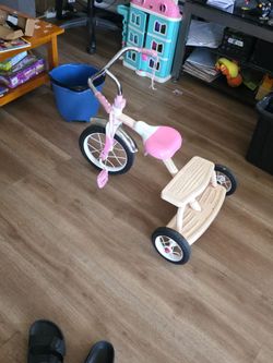 Pink tricycle