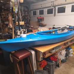 kayak 124" solid shell with paddle