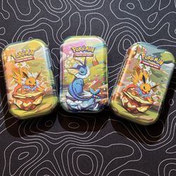 Prismatic Evolutions Tins