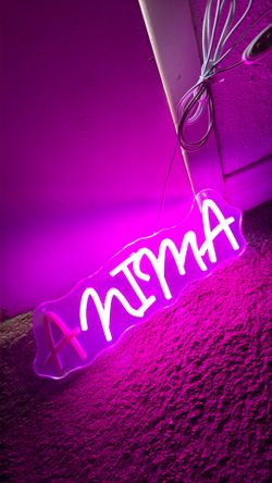 custom pink neon sign features flexible LED silicone strips mounted on a clear acrylic backing board.$15