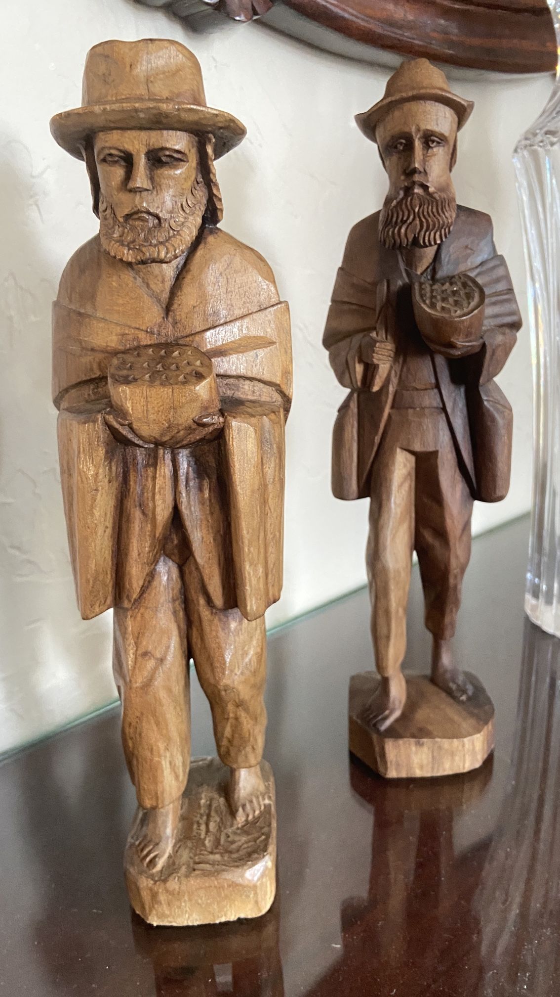 Two Wood Carved Men