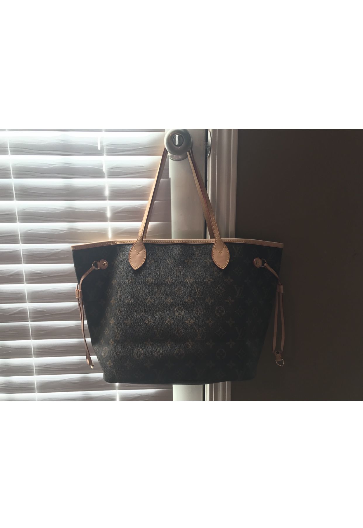 Just in Louis Vuitton Neverfull with box and receipt… like new  condition….Retails at $1605 get it here for $1195