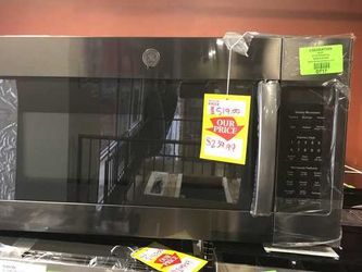 Brand New GE Over the Range Microwave BUNH
