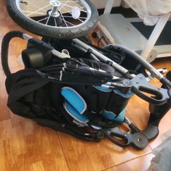 3 Wheels Stroller And A Car Seat