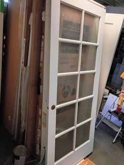 36x80 solid wood left hand ,no frame available now, single french interior door