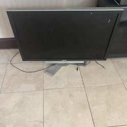 Dell 3007WFP-HC, Gray, And Attached To Speakers Underneath