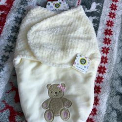 Baby girl swaddle.