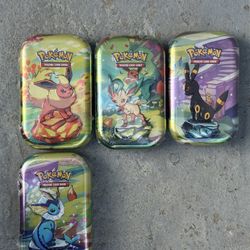 Prismatic Evolution Tins Sealed 