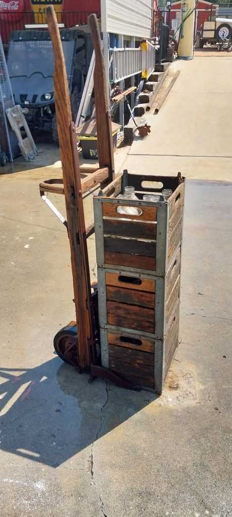 Antique Dolly and milk cases.