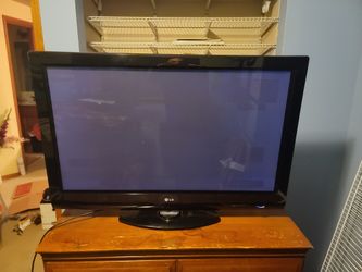 42in LG plasma TV with remote.