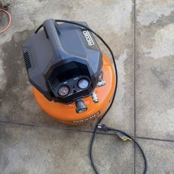 RIDGID 6 Gal. 150 PSI Portable Electric Oil-Free Jobsite Pancake Air Compressor with Dual Pressure G