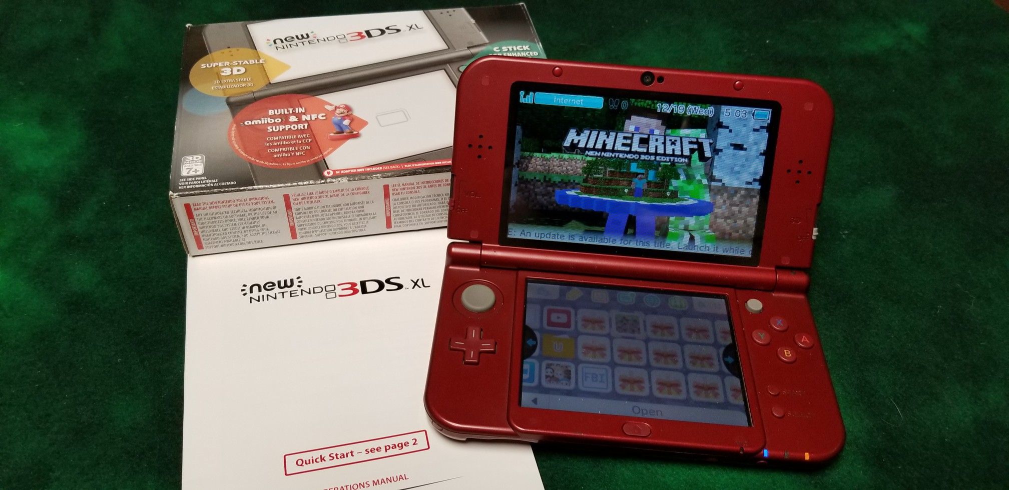 Nintendo NEW 3DS XL modded with about 100 games, box, manual and charger