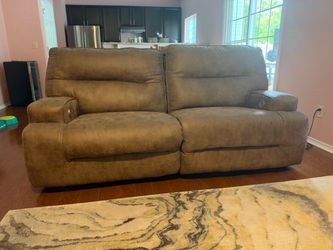Like New 2 piece Set Power Reclining Sofa and Loveseat (center console and cup holder)