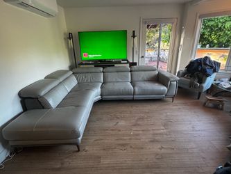 Leather “L” Couch with electric reclining seats