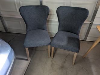 Blue fabric dining chairs - If pictured, they are available.