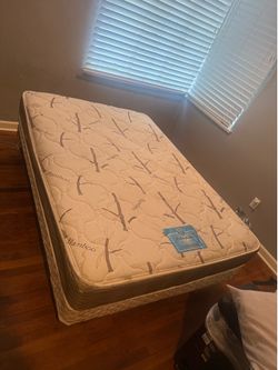 Used twin bed mattress boxspring and rolling frame