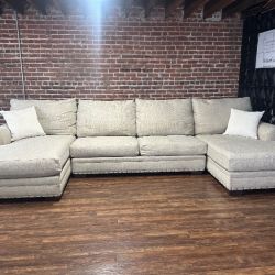 Delivery Available beige Ashley U shape sectional sofa couch