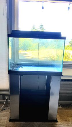 45 / 50 gal. Not quite sure. Somewhere in that range. Comes with stand and hoodlight. I do have all the interior decor and rocks.