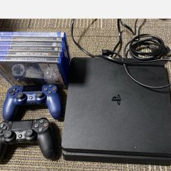 PlayStation 4 Slim 1 TB W 2 Controllers, 6 Games. 