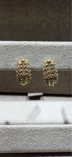 Gold stud earrings