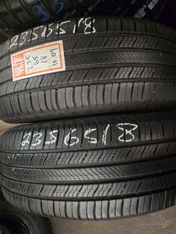 2 Tires 235.65.18 Michelin Defender 90 % Tread Dot 4423