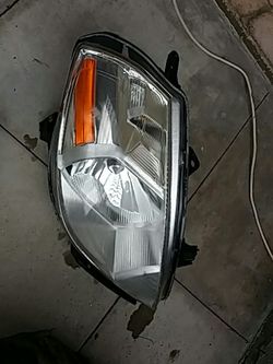 08 versa RH side headlamp