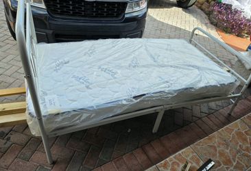 Metal single bed with mattress