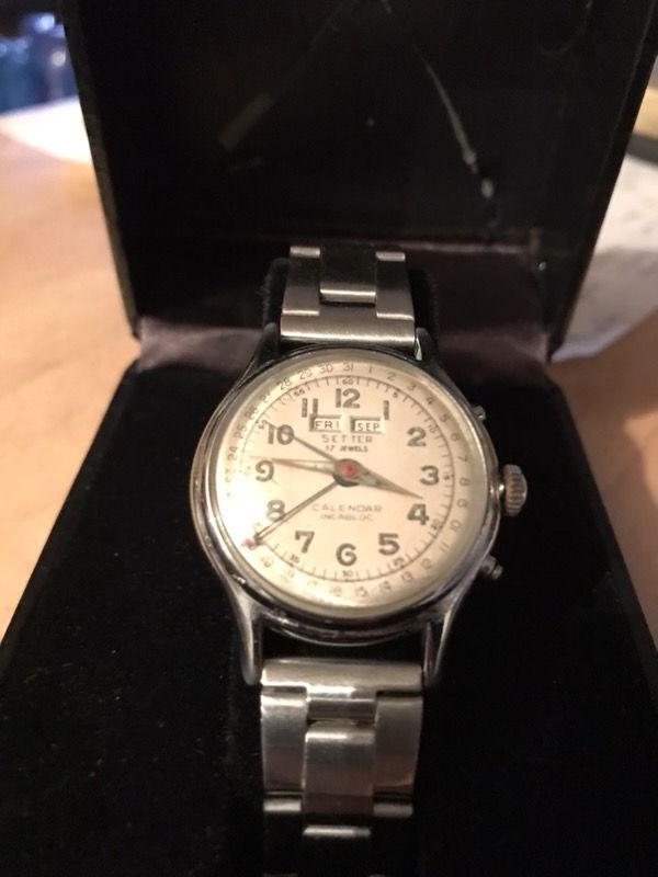 Vintage Louvic Unadjusted 17 Jewels Day-Month Manual-Wind Watch