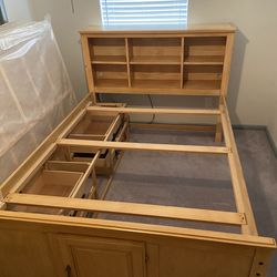 Double size loft bed, four drawers under mattress with a bunky board and matching dresser