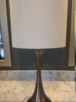 2 Bronzed gold metal table laps with white shade