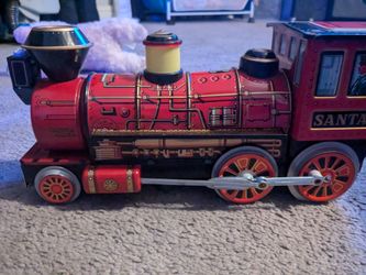 Santa Tin Toy Steam Locomotive Train and puzzles