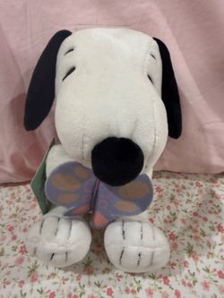 Snoopy Plush Toy holding butterfly